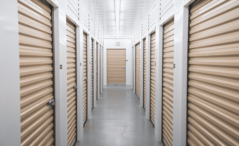 Beechgrove facility self storage units, white walls and beige unit doors